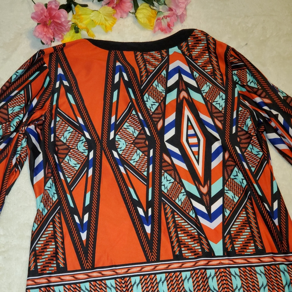 A red blue white mint green blouse